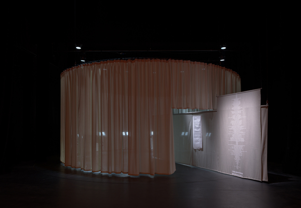 A circular curtain with entrance on the stage