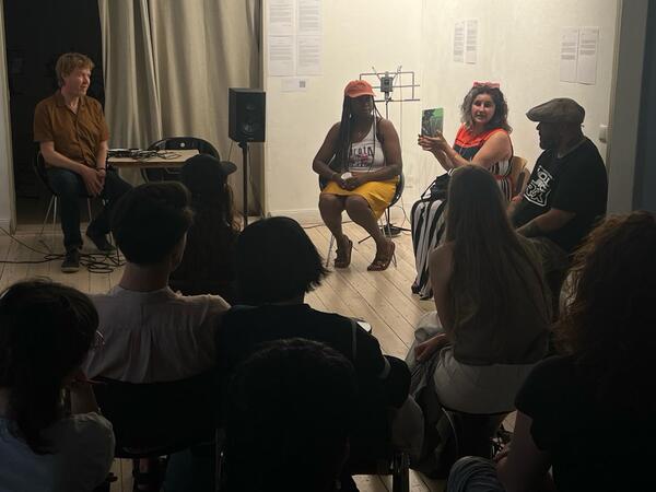 Elsa M'bala and Fari Bradley giving a presentation at the gallery